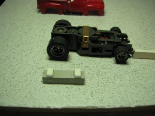 correct ride height. I first placed it on the chassis and marked each side.