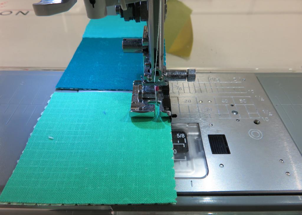 Tip: For more precise piecing, you can use Elmer s school glue and apply a thin line of glue within the 1/4 seam allowance prior to sewing the rows together.