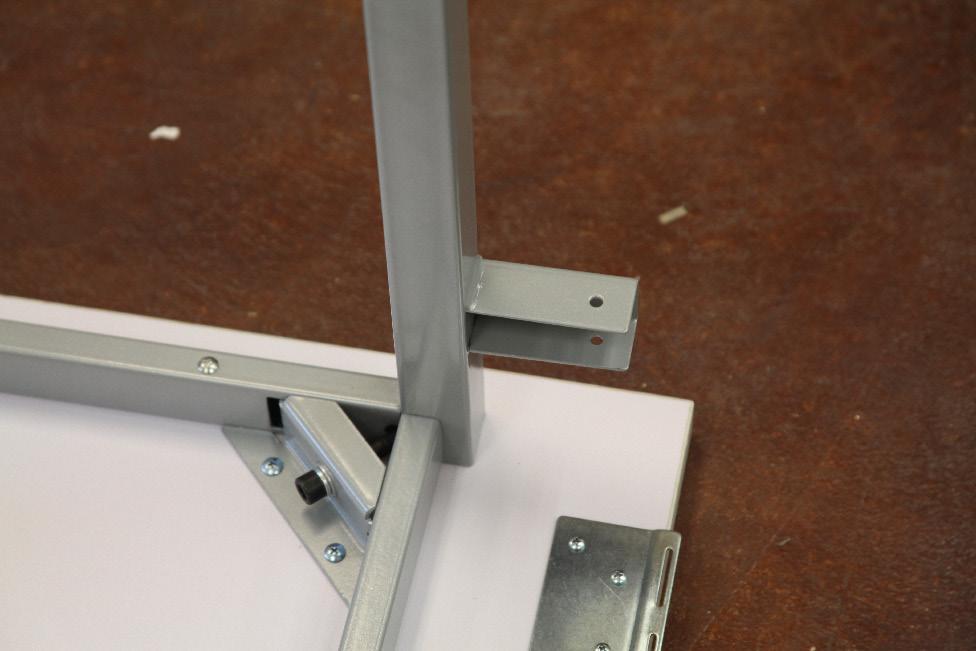 Step 6: Locate the leg with the short piece for the support leg (F). Step 7: This leg will be attached to the left side of the hinged side of the table.