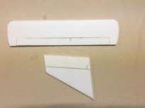 Using a tube or any round object (1-2 inches in diameter by at least 15 inches long), Roll each wing into an airfoil
