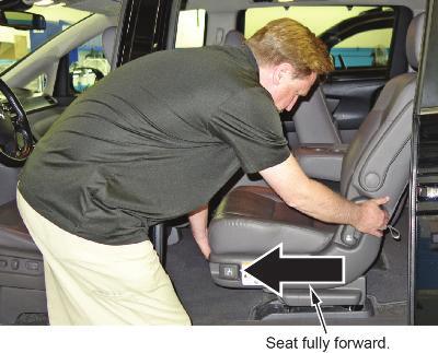 If the seat is installed in the wide position, reinstall it in the wide position before returning the vehicle to the customer for their