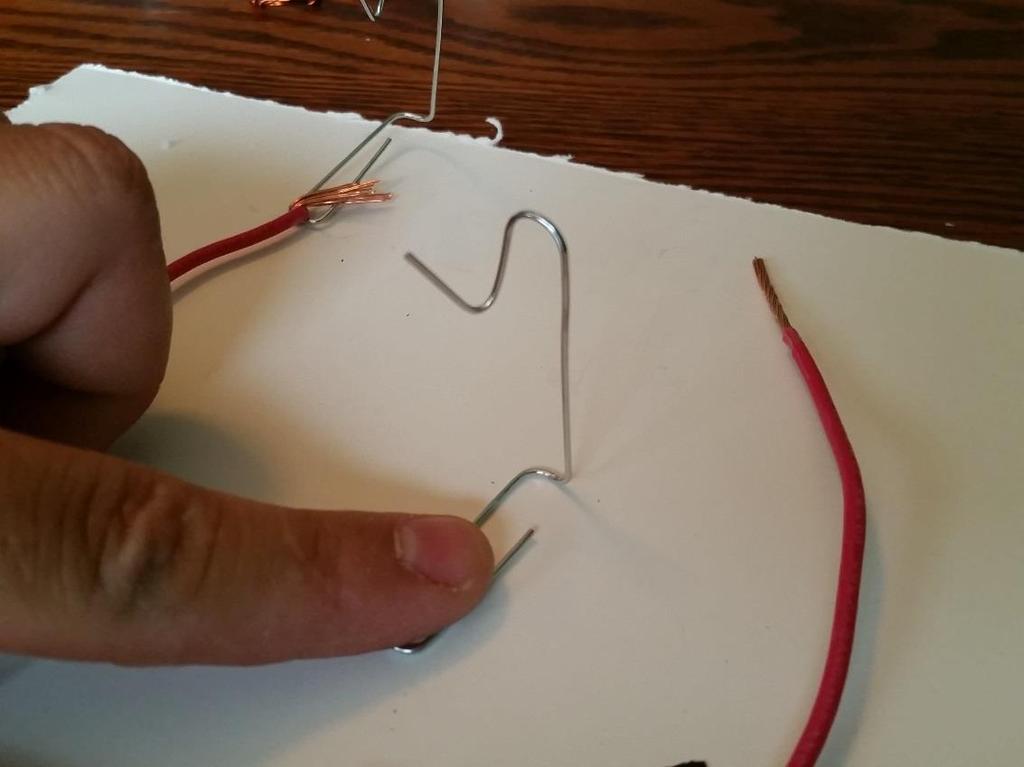 Wrap the other end of each heavy wire around