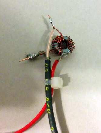 Figure 14: Soldering Toroid Figure 15: Strain Relief Wrap the cable tie around the coax