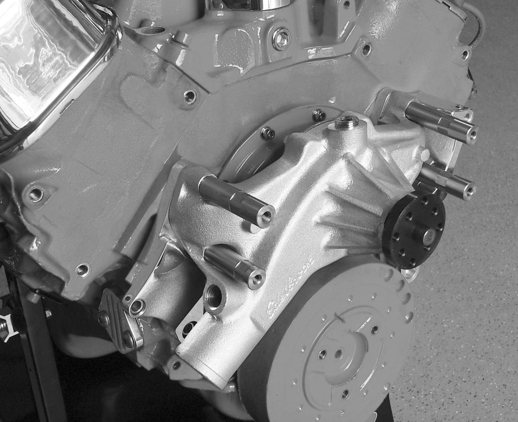 include power steering, now is the time Slide the water pump over the four mounting