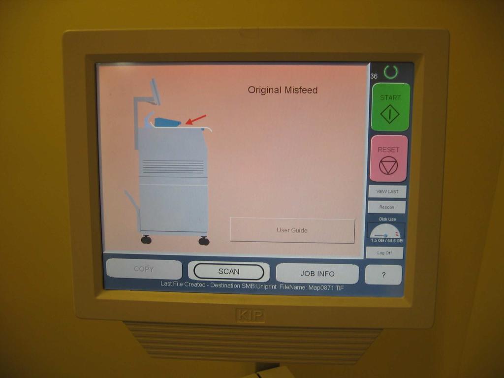 Place your map face up, and slowly feed the map into the machine until it will not push in any further. Wait. The machine will then feed the map the rest of the way in.