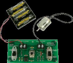 Turn the power switch on the board to the off position, and place the batteries into the battery holder as indicated (Figure 15).