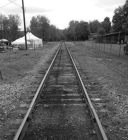 from the viewer. One vanishing point is typically used for roads, railroad tracks, or buildings viewed so that the front is directly facing the viewer as illustrated above.