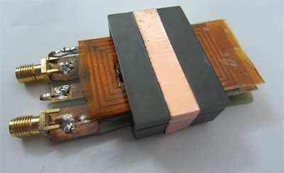 3 Huang and Ye Inductor layer (upper) ( 1 ) Inductor layer (lower) ( ) 2 Positive coupling ground part ('' ) 3 Negative coupling ground part (' ) 3 Magnetic core (E38 + PT38) eakage layer Axis of