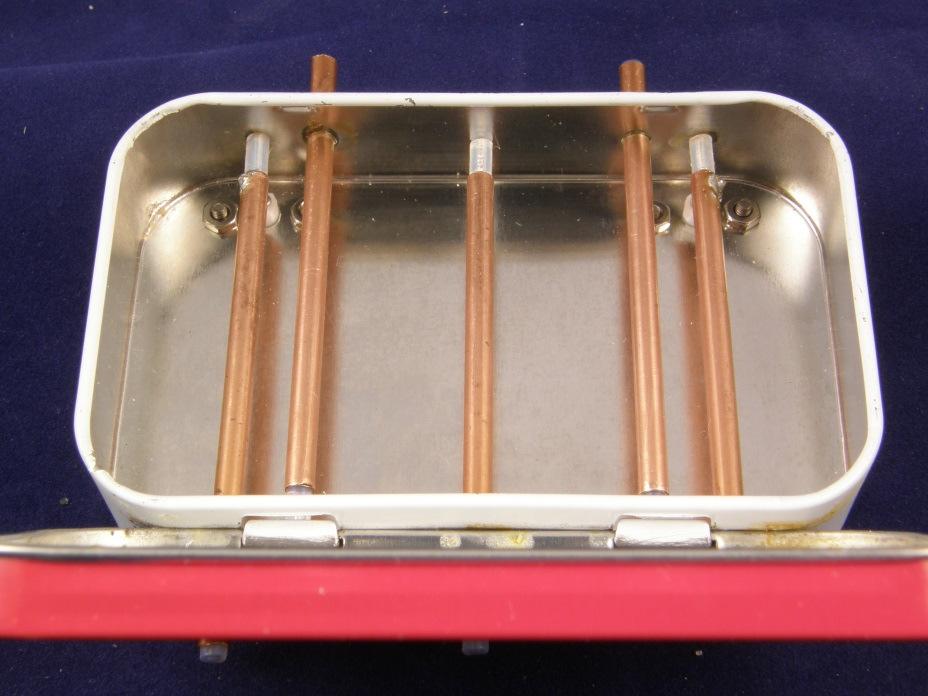 Figure 6 Interdigital filter with coupled-rod input and side connectors The 1296 MHz filters in Figure 6 with the side SMA connectors show limited out-of-band