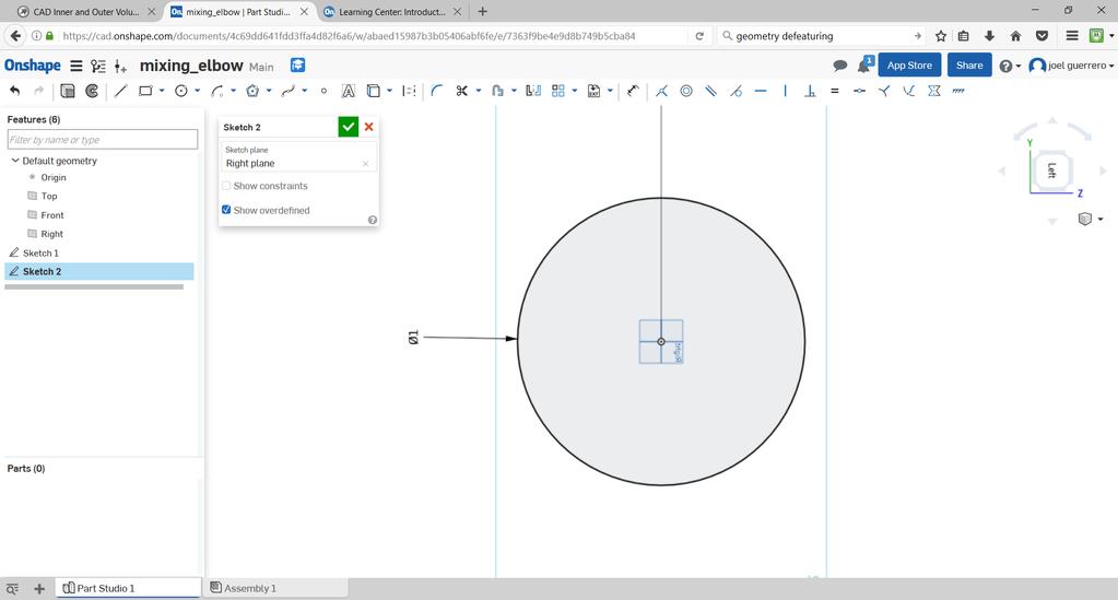 Select the right plane and start a new sketch. Draw a circle with the center in the origin (the white point).