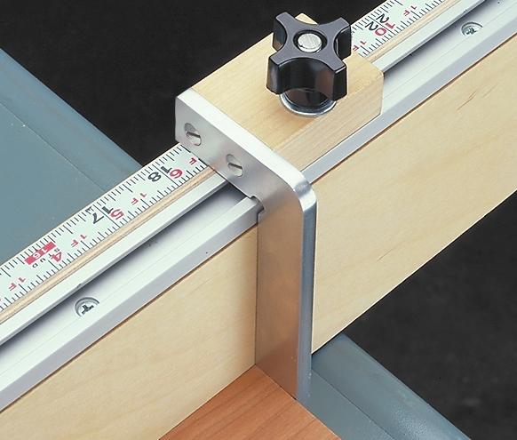 It provides more support for a workpiece than the miter gauge by itself. Plus, you can clamp a wood block to it to make repeat cuts.
