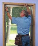 Apply pressure to the vinyl or aluminum jamb liners to relieve tension and remove upper sash.