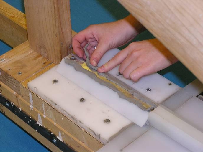 Although the seams between the top of the mandrel and the plastic pieces