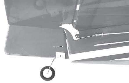 Hold the vertical fin in place with T-pins or masking t ape
