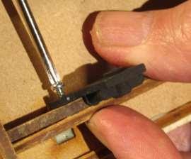 Close the ring up again with the pliers and then cut the lugs from the axle guards.