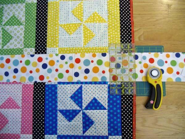 6. Lay out your pieces: quilt top, borders and corner squares.