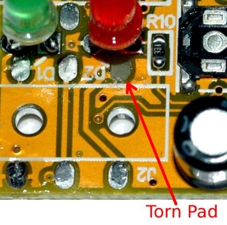 Even if you choose to leave the other push buttons it is still much easier to completely remove the switch where the PTT transistor will go.
