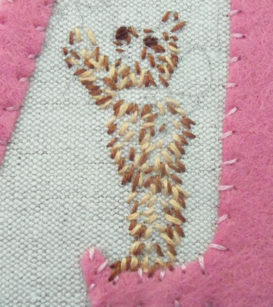 Before you add more stitches to his head you might find it easier to indicate where his