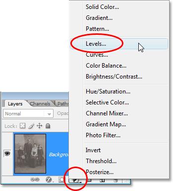 Adding a Levels adjustment layer above the image.