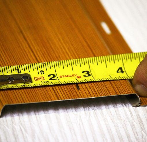 Step 1: Measure from the last panel into inside edge of finishing trim,