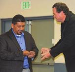 (Left to right) President John Flowers, recipient of 60-Year Gold Card Brother Juan Gomez, Business