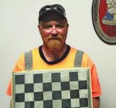 Brother Bill Gillespie shows off his polished and stained concrete chess board. Looks great!