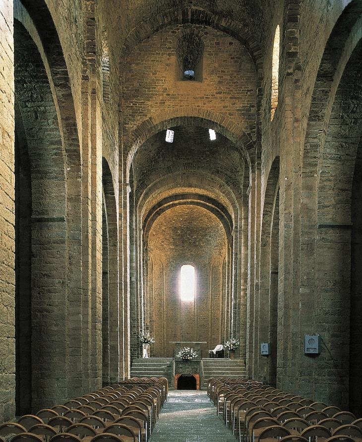 Interior (looking east) of Sant Vicenç, Cardona, Spain, ca. 1029 1040. Typical Romanesque Church- heavy looking.