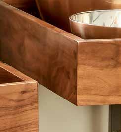 Designed for 18 blind corner cabinet openings, this two-tier organizer features a contemporary orion gray frame with walnut dovetail drawers that glides