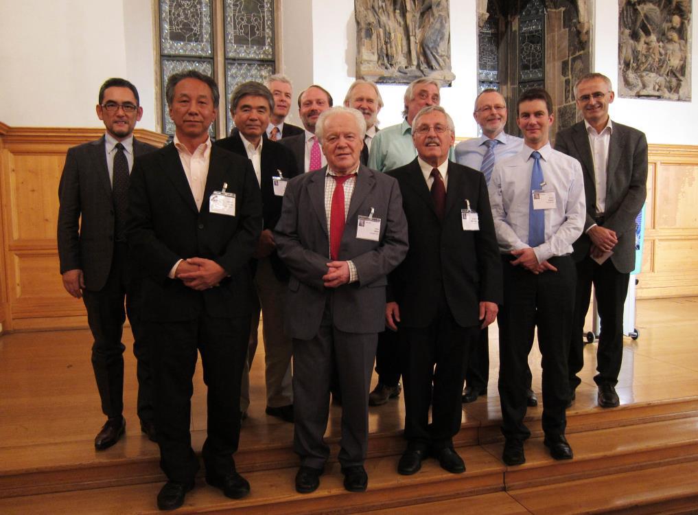 It shows in the first row from left: Prof. Daisuke Ueda/ Keynote speaker/ Panasonic; Prof. Dieter Silber and Prof.