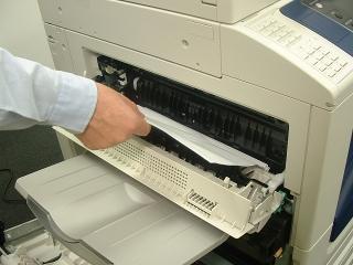 Paper Jam in Top Left Cover (Cover E) 1 2 1: Ensure machine has stop printing / copying.