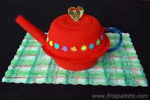 Little Teapot Materials Two small paper bowls Construction paper Any water-based paint Paint brush Scissors Pipe cleaner Glue gun Glue stick Stapler Pencil Pompom or large bead Sequins or craft foam