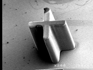 20 microstructure with tapered sidewalls (narrower top and wider bottom) To obtain the desired tapering angle in the SU-8 plating mold for mold insert fabrication or micro needle array, an exposure