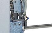 An encoder is integrated in to the clamp rollers to provide the precise positioning to the programmed length.