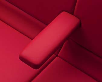 Fully upholstered arms blend with specified textiles or leathers to complete the color