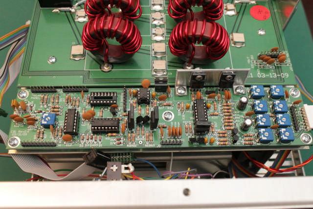 This board has quite a few ribbon connectors (most of them disconnected in this picture) that interface to other parts of the amplifier: To get at the PA units below, you have to remove all of the