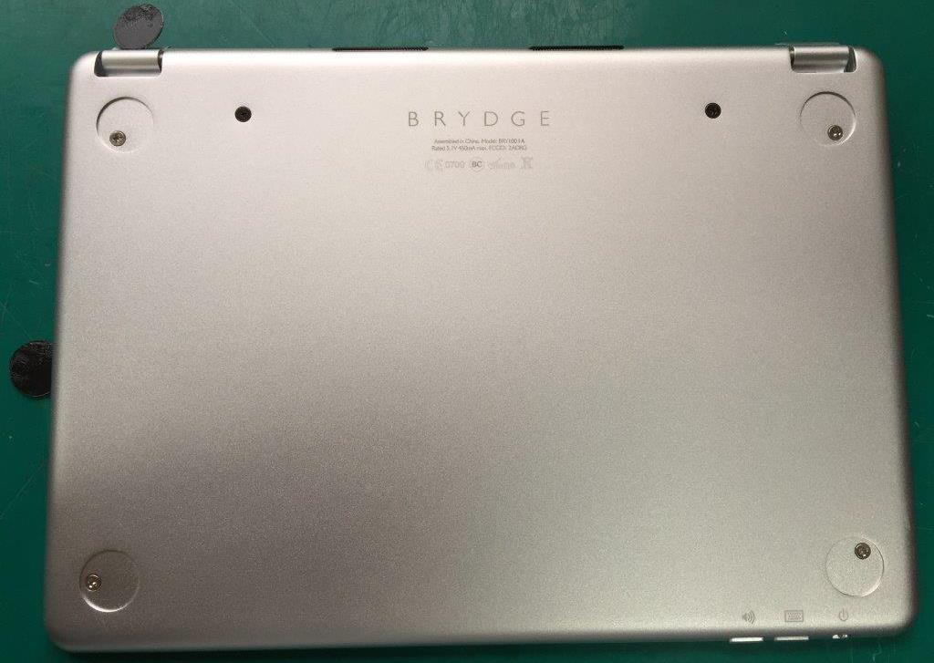 BrydgeAir Keyboard for ipad Air Step 1: Remove the four glued black Rubber Anti-Skid Pads from the back cover(circled in Green).