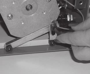 adjust guide location by removing the adjusting screw and moving guide to the various slots on the table top (Fig.10). Fig.8 Adjust with set screw Fig.9 Fig.10 Band Saw Use and Maintenance A.