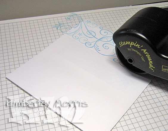 Roll the flap of each envelope with the So Swirly Jumbo wheel, using the Bashful Blue ink cartridge. 2.