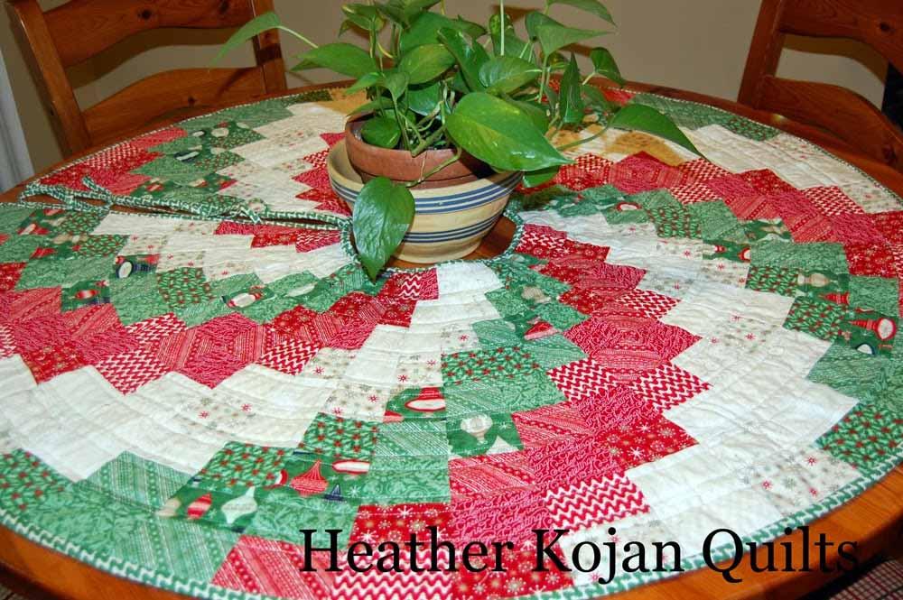 Or, maybe a fun and unique baby quilt or play mat. Simply applique a center circle and you're good to go!) So, this is truly made in July, and nary a Christmas tree to be seen.