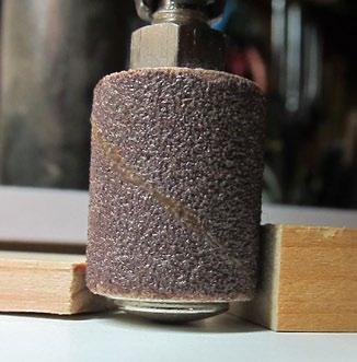 By tightening the compression nut you are you are also compressing the rubber drum, forcing it s sides to expand, putting pressure onto the inside edge of the sanding sleeve.