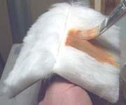 Cut two squares of fur a little larger than each side and glue them on making sure