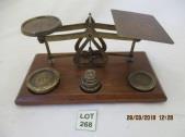 268 Wood and brass postal scale sold with 6
