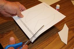 Following the pattern construction lines, cut to shape with scissors.