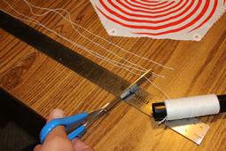 5. Cut six pieces of string to approximately 350-550mm.