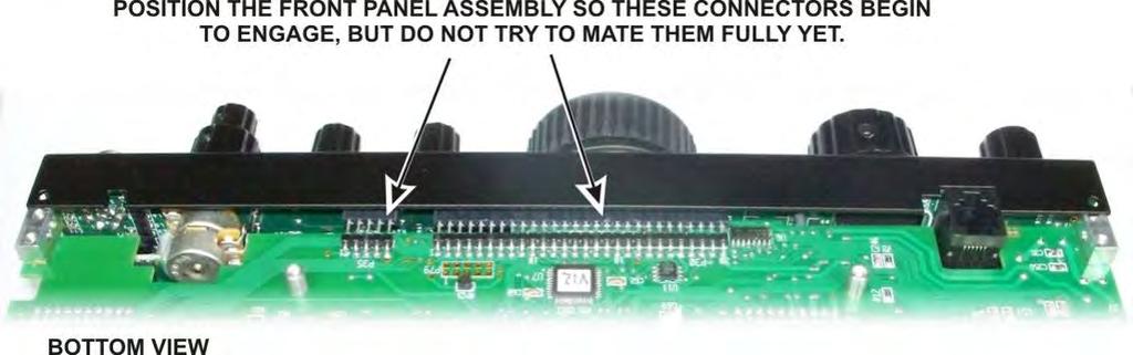ESD SENSITIVE: Wear a grounded wrist strap or touch an unpainted metal ground before handling the RF Board in the following steps.