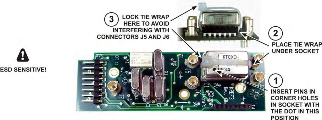 Mount the TCXO module on the KREF3 board as shown in Figure 69. Be certain the leads go into the corner holes in the socket and the black dot is oriented toward connector J6 as shown.
