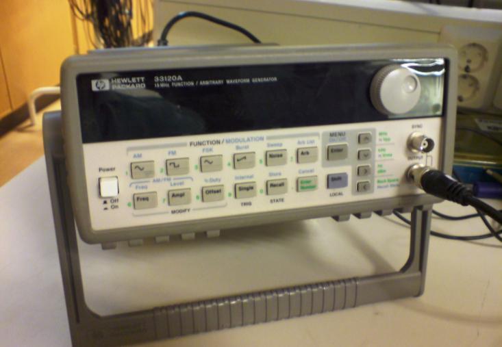 Figure 3.3. Experiment lab board for electronic circuits. Figure 3.4. HP 33120 function generator. 3.2 Preparations Connect a summing amplifier circuit according to Figure 3.