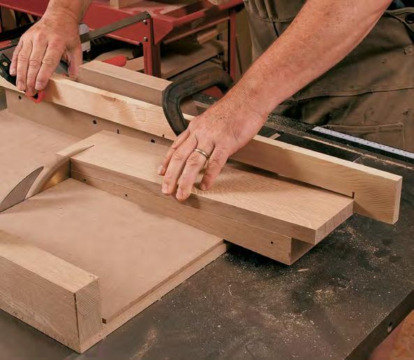 -wide box-joint blade set to cut the cheek and shoulder in one pass (left). Then he adds a spacer next to the wedge to cut the second cheek (above).
