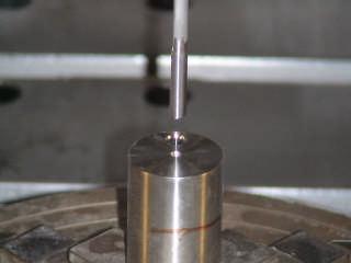 The process for gun drilling on a milling machine requires a pilot hole to start the drill. This pilot hole was machined in the part using an end mill, see figure 4.