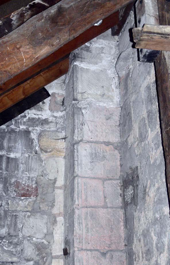 Fig 4 North aisle roof, photograph (P1010818) of capital and shaft on east wall, remains of